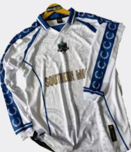 Jersey football putih biru Rakus United berbahan Airwalk